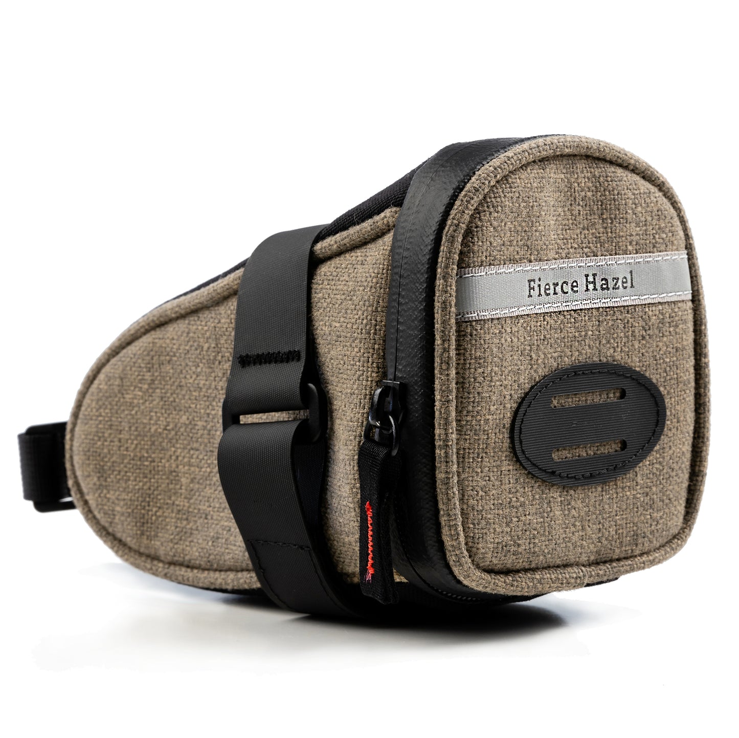 The True Grit Saddle Bag by Fierce Hazel is photographed on a white background. It is made fro eco-friendly Olefin