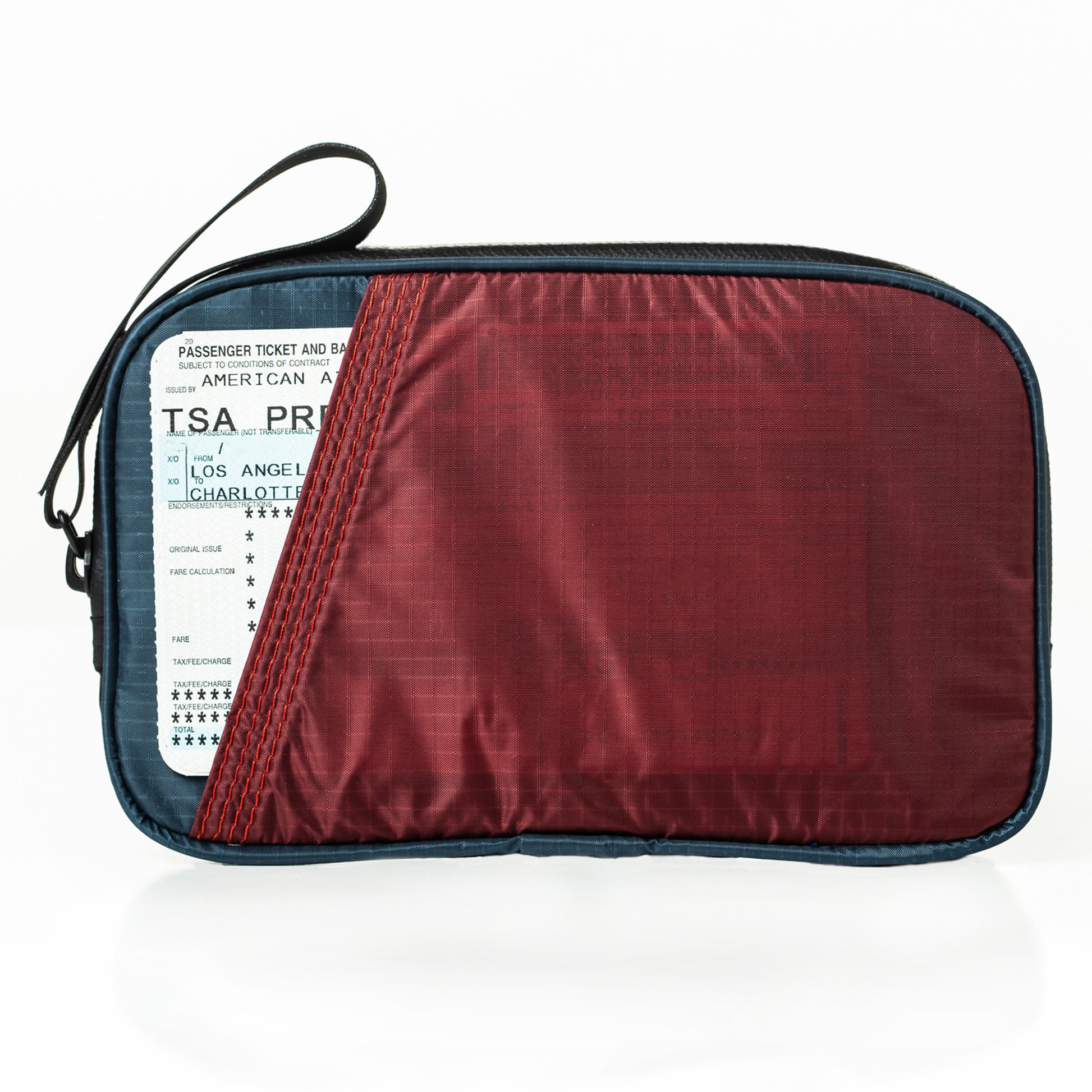 Back side with airline ticket of the world's lightest cycling ride wallet. Ultra-lightweight, weather-proof, made from deadstock. Works as a phone case and travel wallet