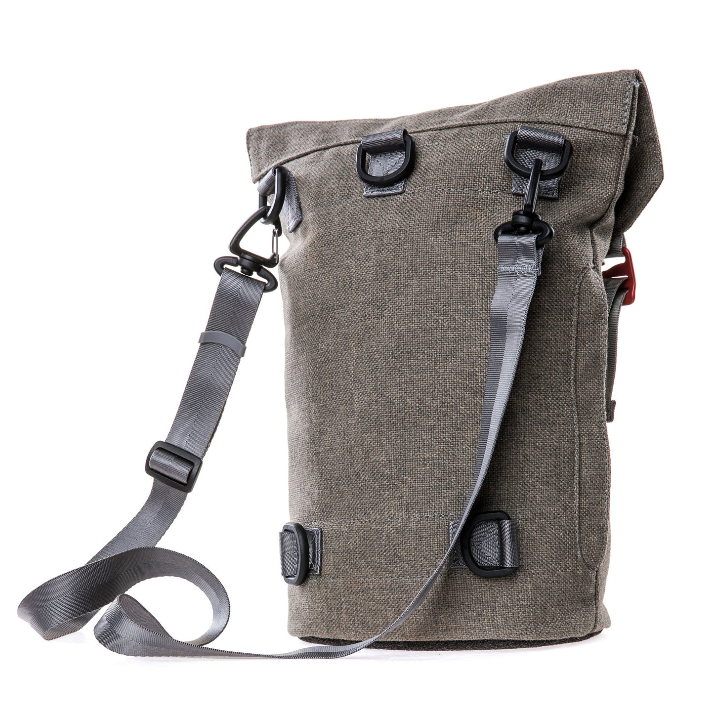 Side of a Fierce Hazel convertible backpack made with sustainable fabric.showing cross-body style.  Functional, rugged and water-resistant it is military styled but beautiful